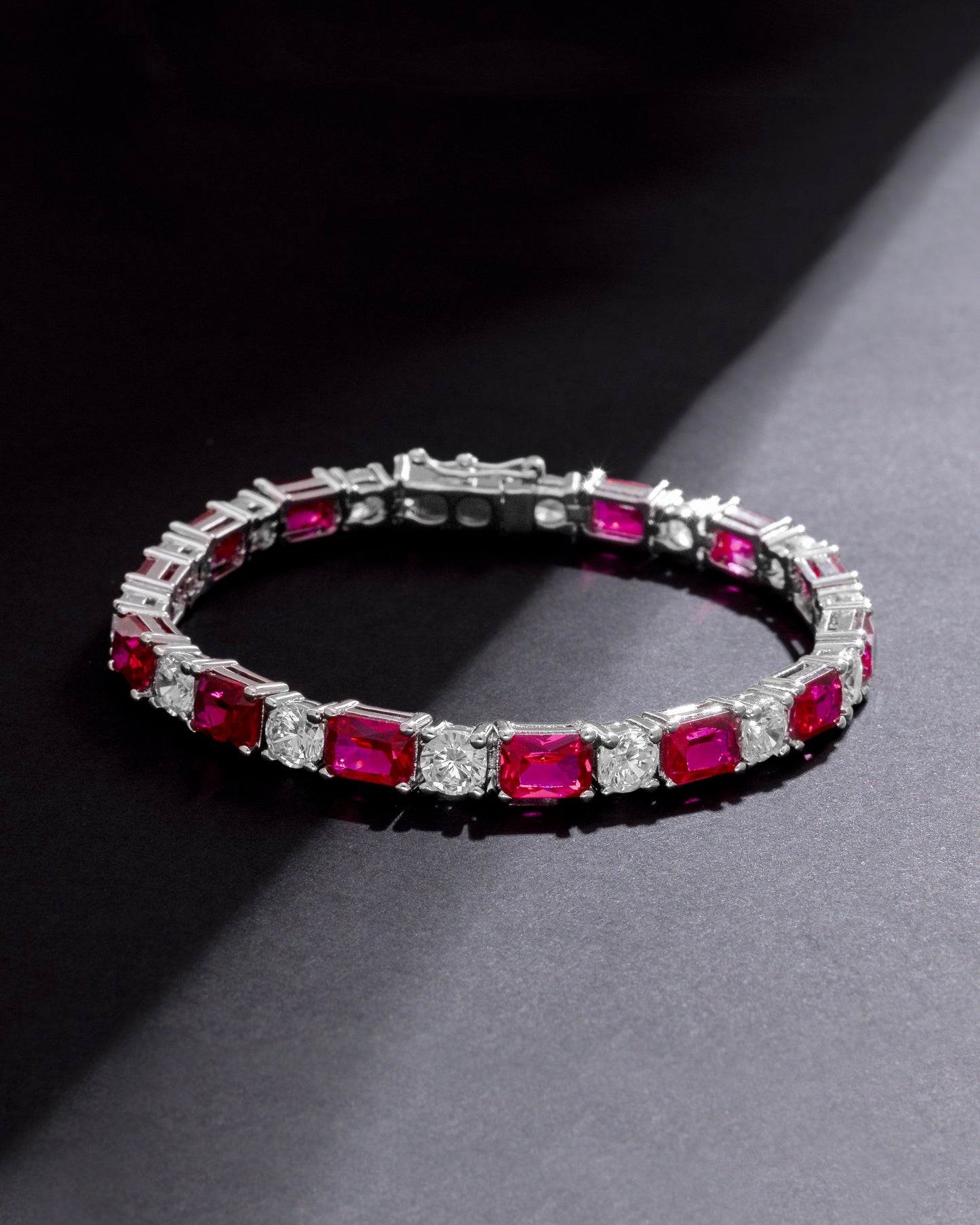 TENNIS BRACELET STUDDED WITH RED ICE CUT CZ