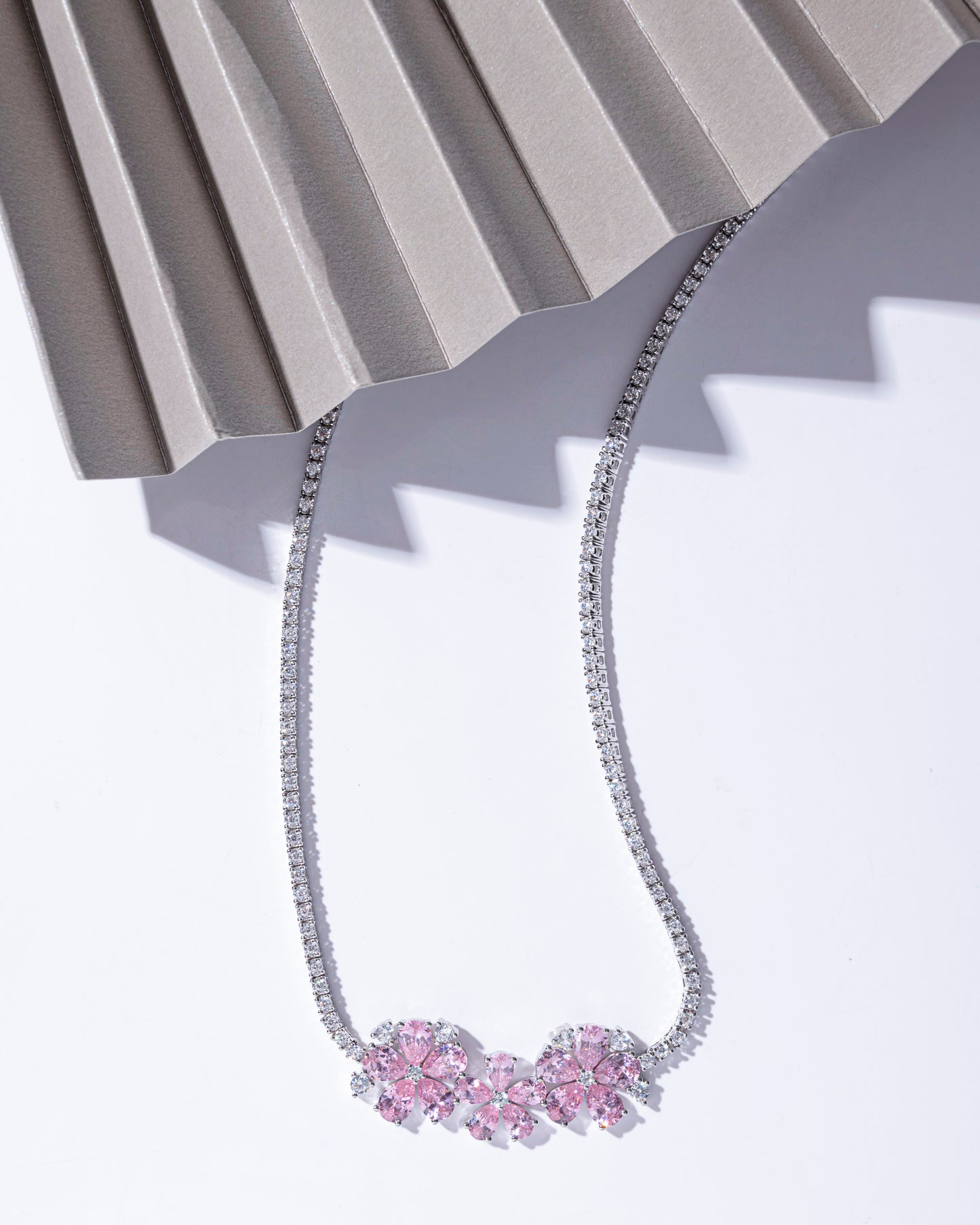 PINK ICE CUT CZ FLORAL STRING