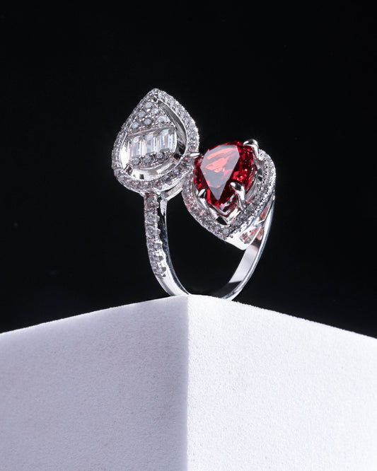 RING STUDDED WITH ICE CUT RED CZ