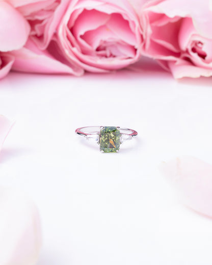 RING STUDDED WITH ICE CUT GREEN CZ