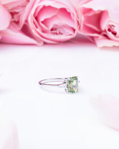 RING STUDDED WITH ICE CUT GREEN CZ